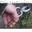 MUTA metszőolló, kovácsolt, fanyelű kivitel használatban